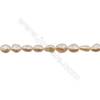 粉色天然淡水珍珠 再生珠 尺寸 6~11x6~8 毫米  孔徑 約0.6 毫米 x1條 15~16"