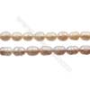 Perles culturelles perles d'eau douce pêche ou lavande sur fil  Taille 10~11mm  trou 0.7mm x1fil 15~16"