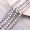 Fili di perle grigie d'acqua dolce, rotonde, dimensioni 9~10 mm, foro 0,8 mm, 15~16" x 1 filo