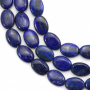 Miçangas de lápis-lázuli  ovais. Tamanho: 10x14mm. Orificio: 1mm. 29pçs/fio. 15~16"